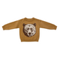 Brown sweater with bear design on a white background