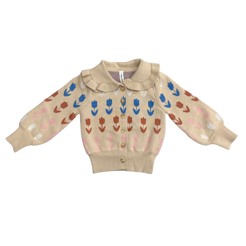 Beige sweater with floral pattern on a white background