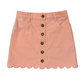 A dusty pink corduroy mini skirt with a scalloped hem, featuring a front button closure and belt loops, shown flat on a white background.