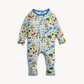 A baby footed one-piece sleeper with long sleeves and legs, featuring a colorful cartoon animal and landscape print on a white background with a blue collar.
