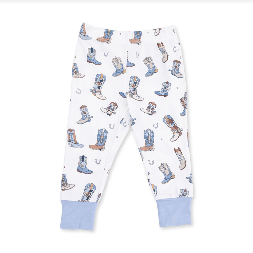 White children's lounge pants with an all-over cowboy boots print in shades of blue, brown, and beige, featuring solid light blue cuffs.