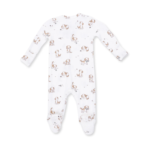 A white long-sleeve baby footed sleeper with an all-over print of brown and beige cartoon dogs, shown flat on a white background.