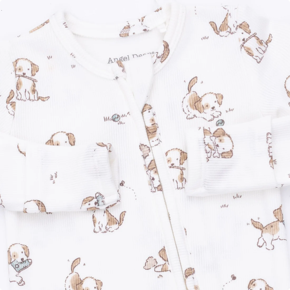 White long-sleeve baby pajama top with a cute brown and beige puppy print, featuring a snap-button front and a visible Angel Dream brand label.