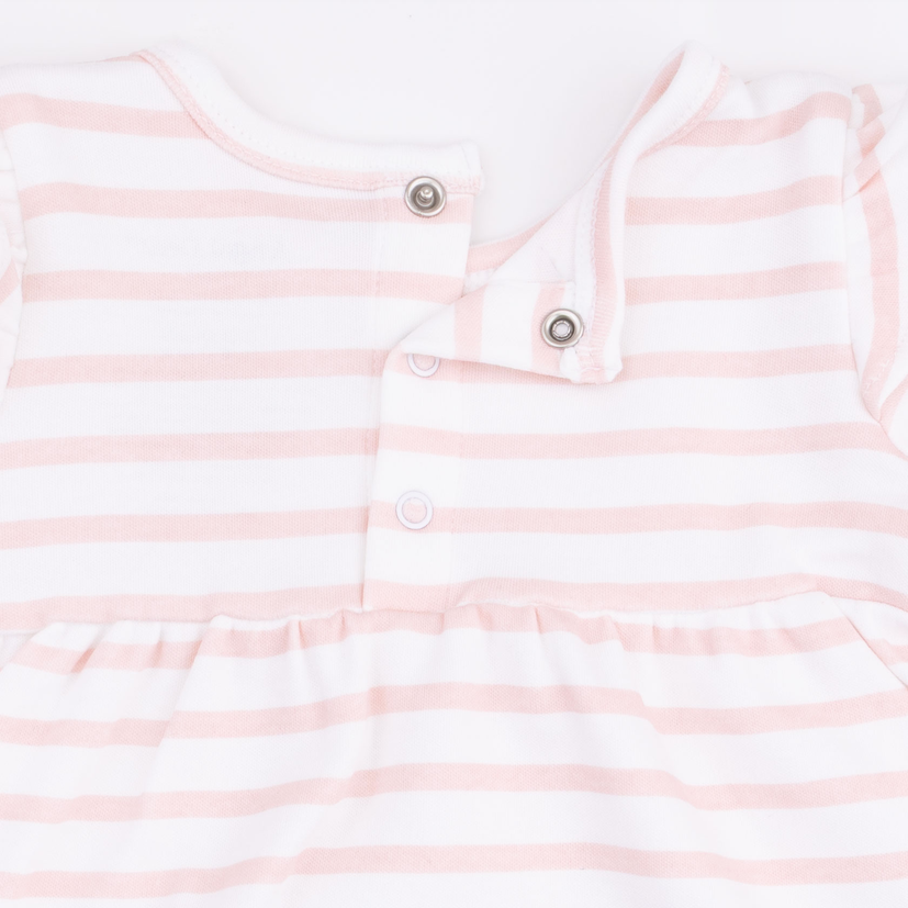 Close-up of a baby romper or bodysuit with horizontal light pink and white stripes, featuring a ruffled neckline and snap-button closure.