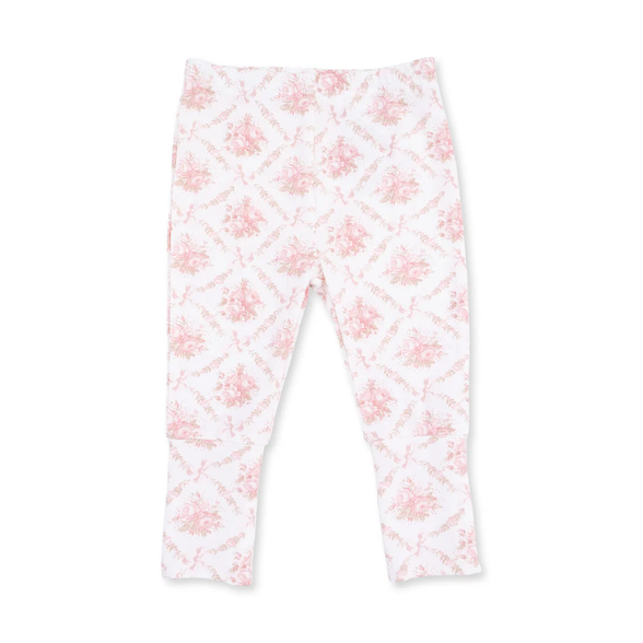 White leggings with a pink floral and diamond pattern, shown flat against a white background.