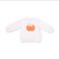 A light pink long-sleeve crewneck sweatshirt featuring a cute orange pumpkin graphic on the chest with a small white cat peeking out, displayed on a clean white background.
