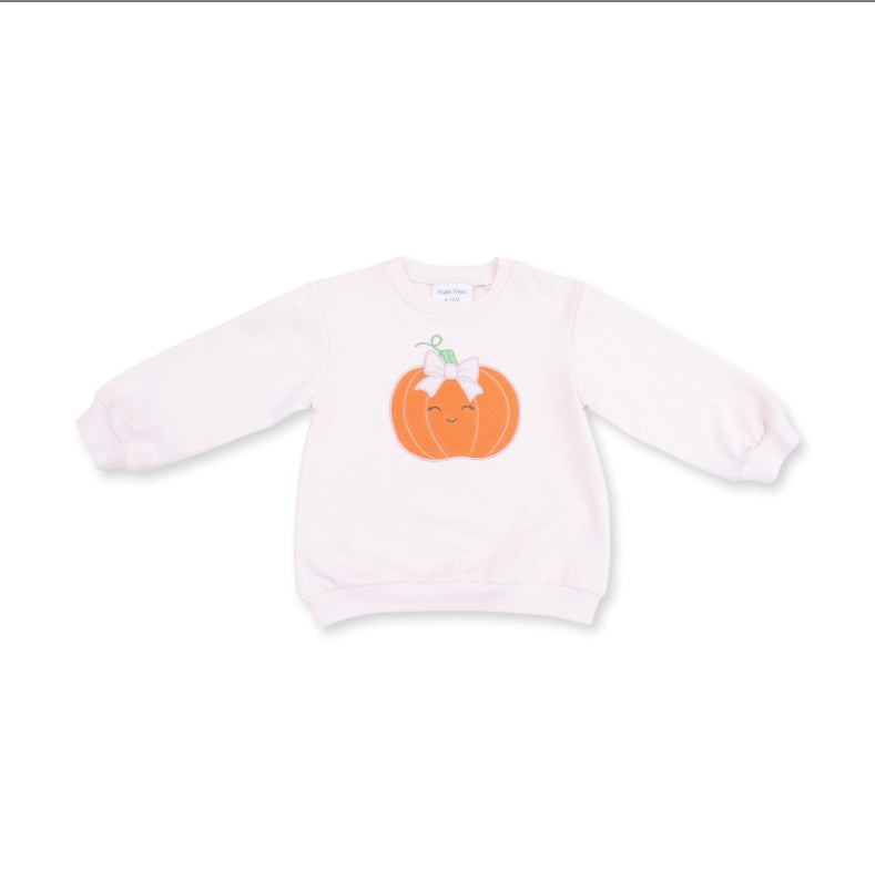 A light pink long-sleeve crewneck sweatshirt featuring a cute orange pumpkin graphic on the chest with a small white cat peeking out, displayed on a clean white background.