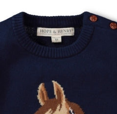 Close-up of a navy blue knit sweater with a brown and beige animal motif at the lower front and a visible HOPE & BENJAMIN neck label.