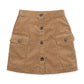 A tan corduroy mini skirt with a button-up front and two large front flap pockets, shown flat on a white background.