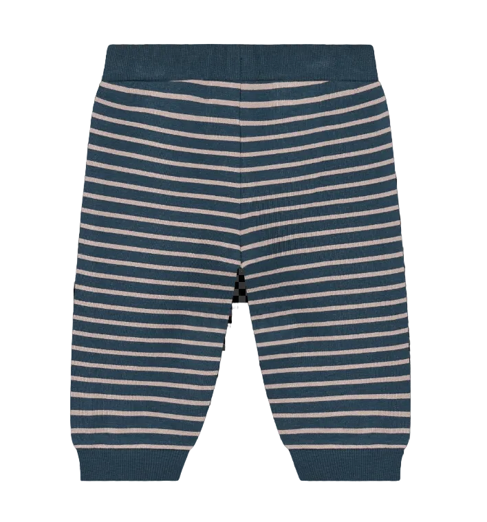 Blue and white striped knit pants with a solid blue waistband and cuffs, shown flat against a black and white checkered transparency background.