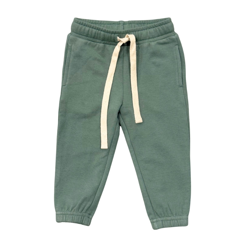 A pair of sage green children's sweatpants with an elastic waistband, cream-colored drawstring, and elastic cuffs, shown flat on a white background.