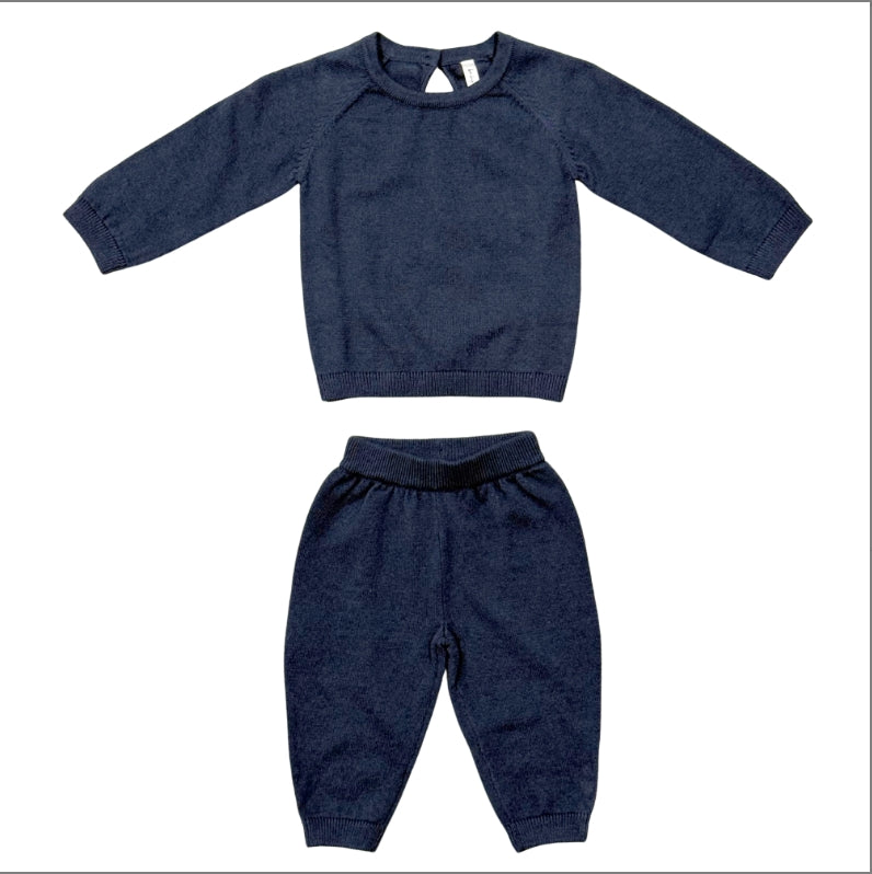 A two-piece baby clothing set consisting of a long-sleeve knit top and matching pants in dark navy blue, laid flat on a white background.