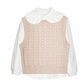 knit sweater vest layered with a white blouse