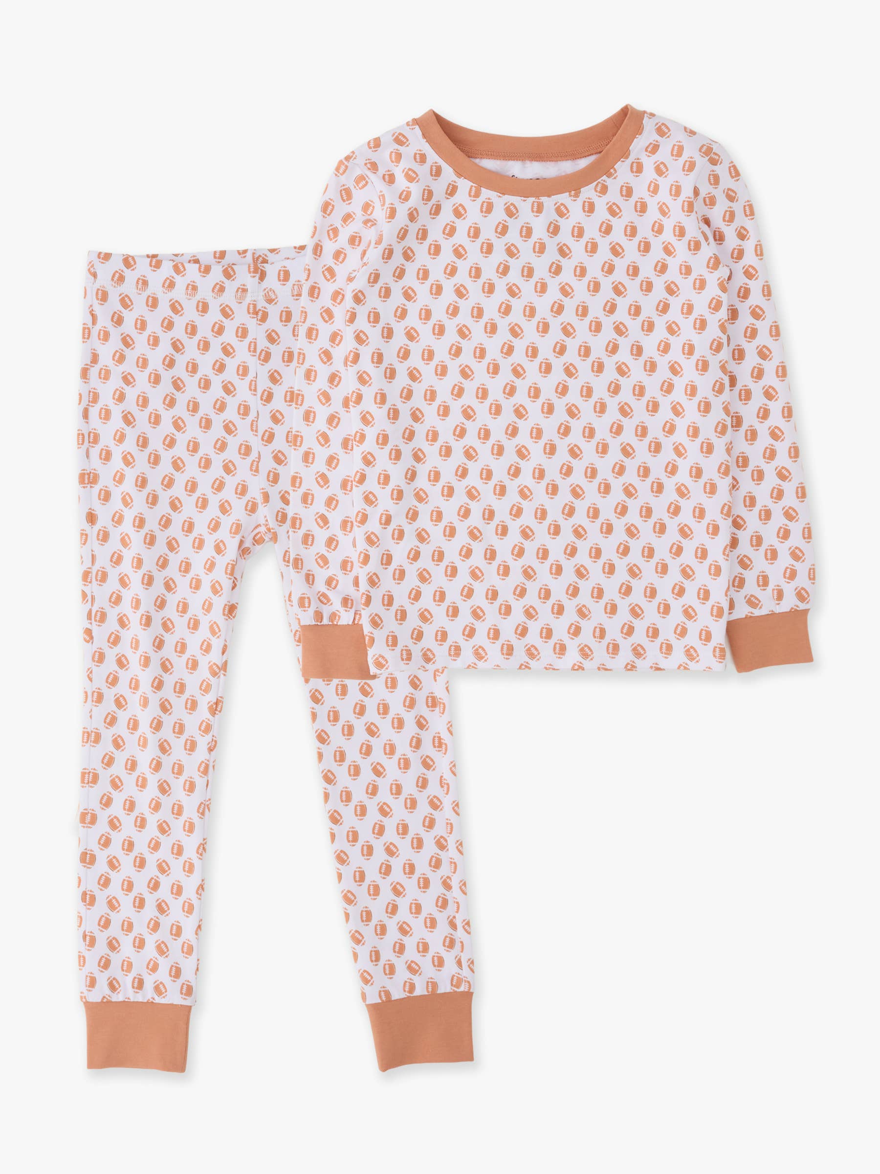 A two-piece children's pajama set featuring a long-sleeve top and matching pants in white with a repeating peach-orange leaf pattern, finished with solid peach-orange ribbed trim at the collar, cuffs, and knee patches.
