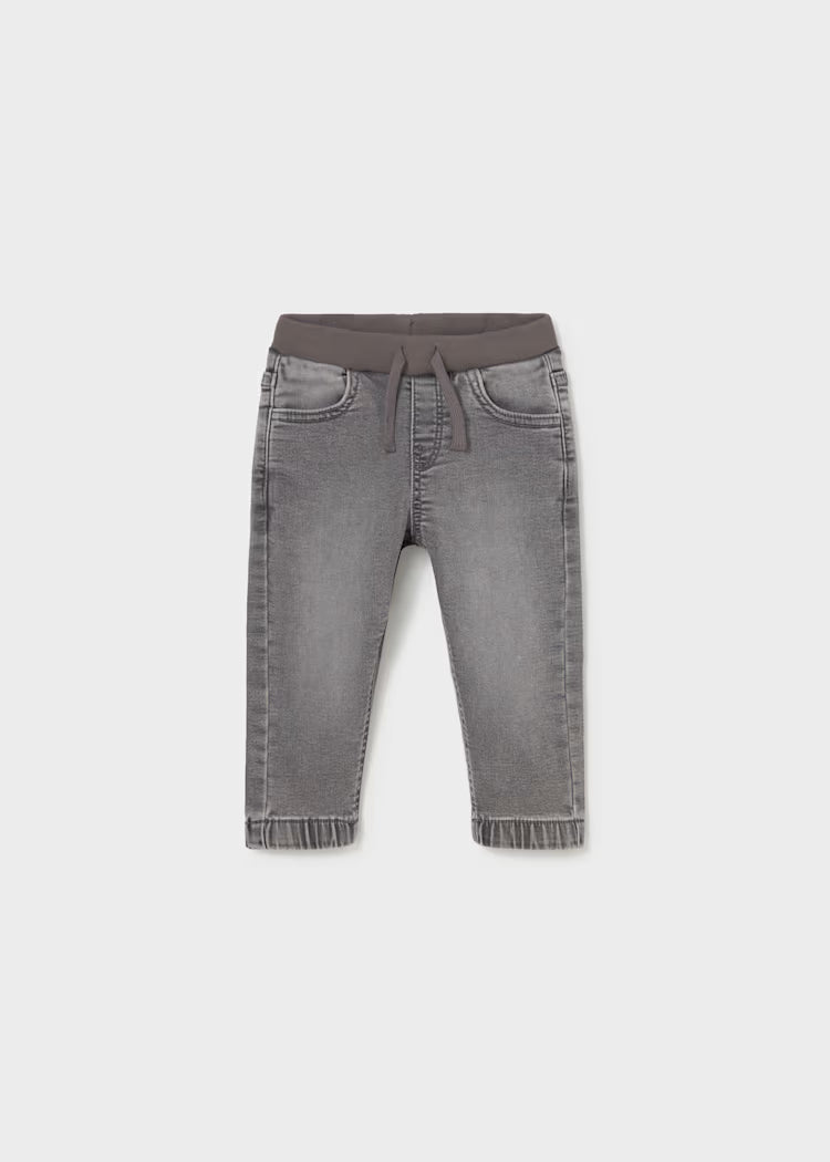 Gray jeans with a brown waistband 