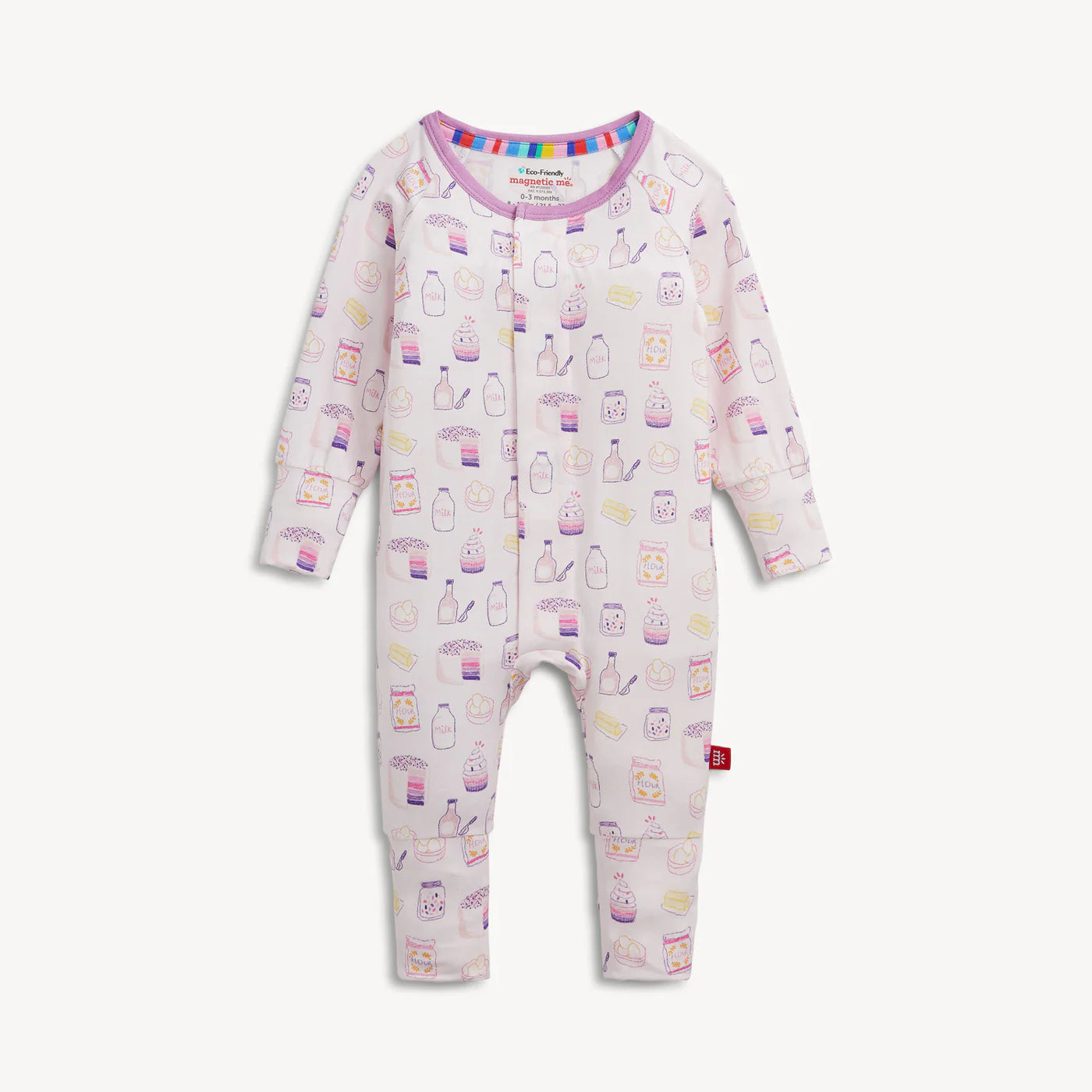A baby long-sleeve footless one-piece jumpsuit in light pink, featuring an all-over print of illustrated cosmetic bottles and jars in pastel colors. The jumpsuit has a colorful striped inner collar and a small red tag on the lower leg, photographed against a solid off-white background.