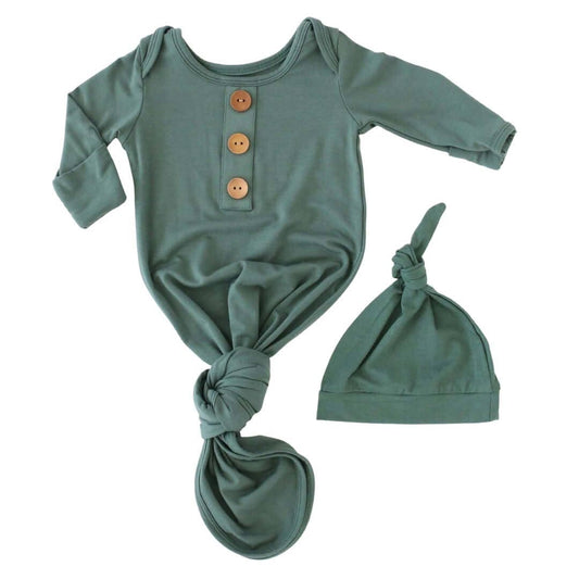 Green baby onesie with buttons and matching hat 