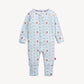 A baby long-sleeve footless one-piece jumpsuit in light blue, featuring an all-over print of teddy bears, elephants, and clouds in soft pastel colors, with snap closures down the front.