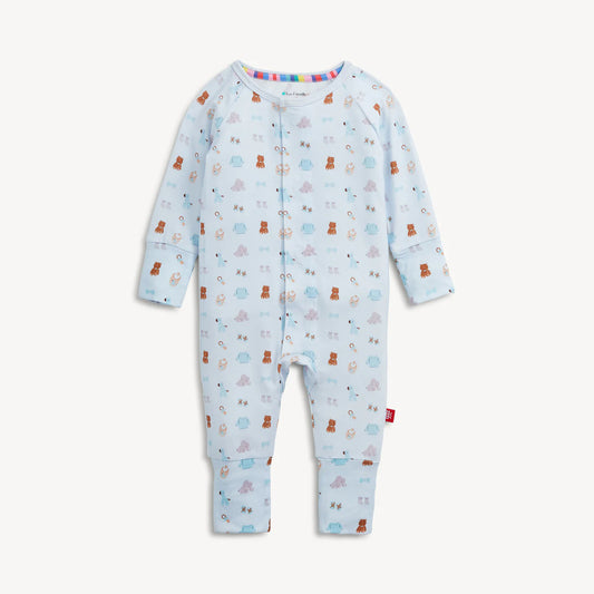 A baby long-sleeve footless one-piece jumpsuit in light blue, featuring an all-over print of teddy bears, elephants, and clouds in soft pastel colors, with snap closures down the front.
