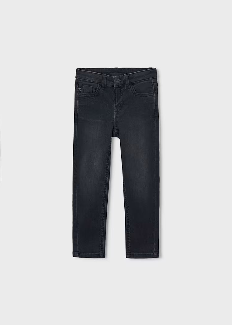 A pair of dark washed denim jeans for kids, shown flat against a light gray background.