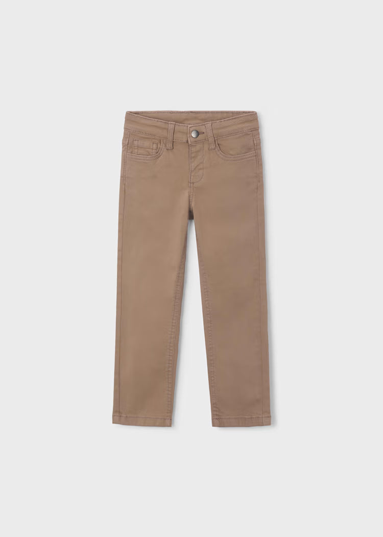 Slim denim jeans in a warm tan or light brown color