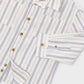 long-sleeve button-up shirt with vertical stripes in navy blue, thin gold stripes, and thin orange stripes on an off-white base.
