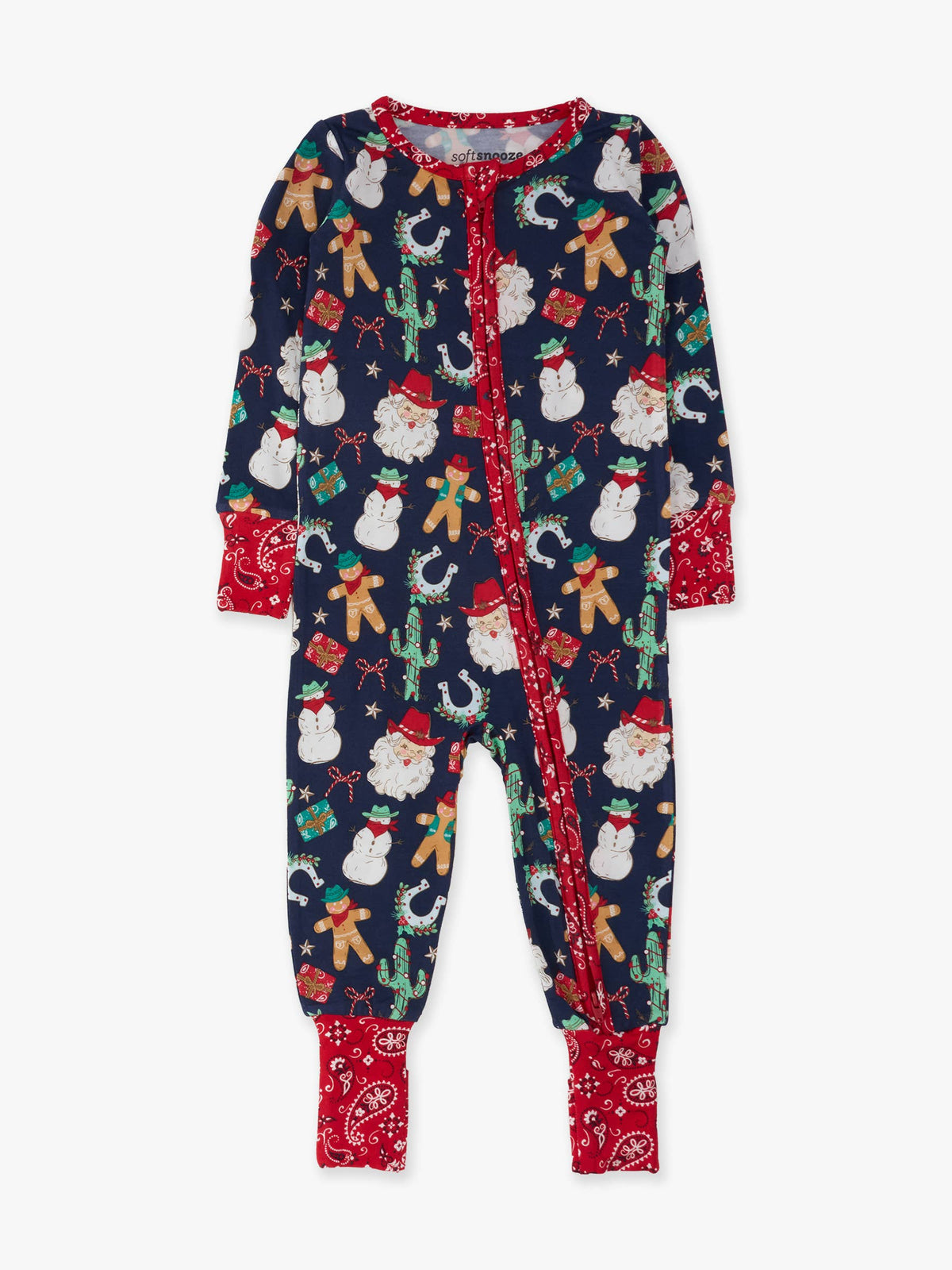 A baby's long-sleeve footed pajama in navy blue with a festive Christmas print of Santa Claus, snowmen, gingerbread men, and cactus, featuring red trim and red patterned cuffs.