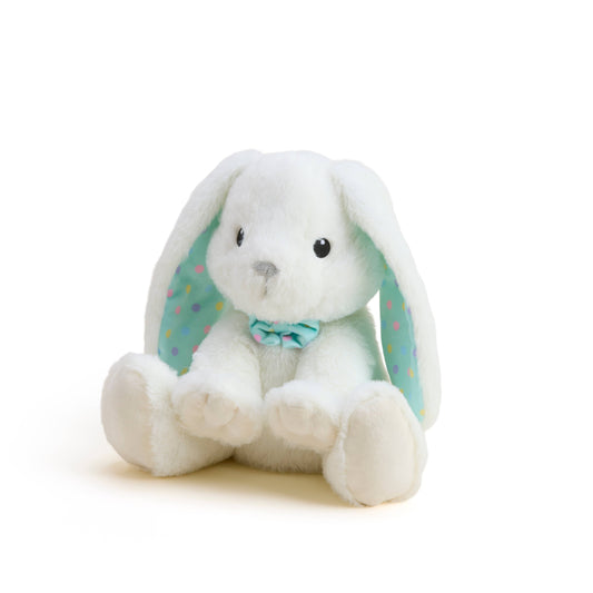 White plush bunny with a blue bow tie