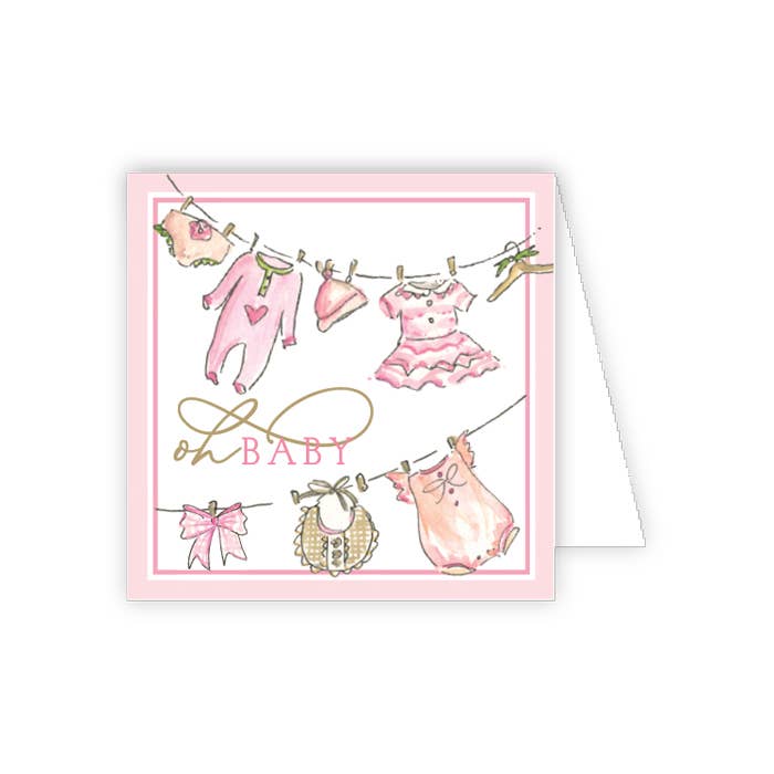 Greeting card with baby clothes on a line and 'Oh Baby' printed in the center