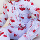 Ruffled Zipper Romper with Cherries and Tied with a bow