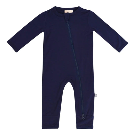 A navy-colored baby romper with long sleeves and dual zippers, made from bamboo rayon fabric.