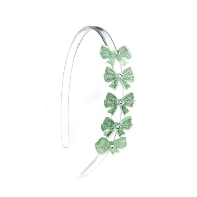 Headband with green bow 