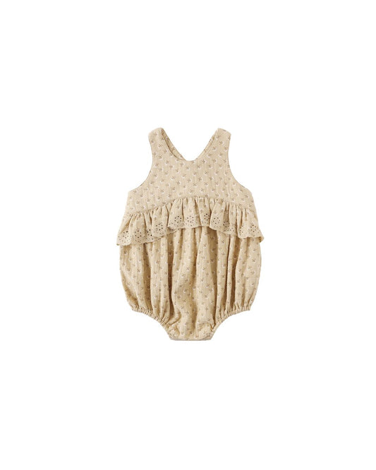 Beige baby romper with lace details 