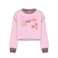 A pink cropped long-sleeve sweater with a 'North Pole' Christmas tree graphic on the chest, ribbed crew neck, cuffs, and hem, shown on a plain white background.