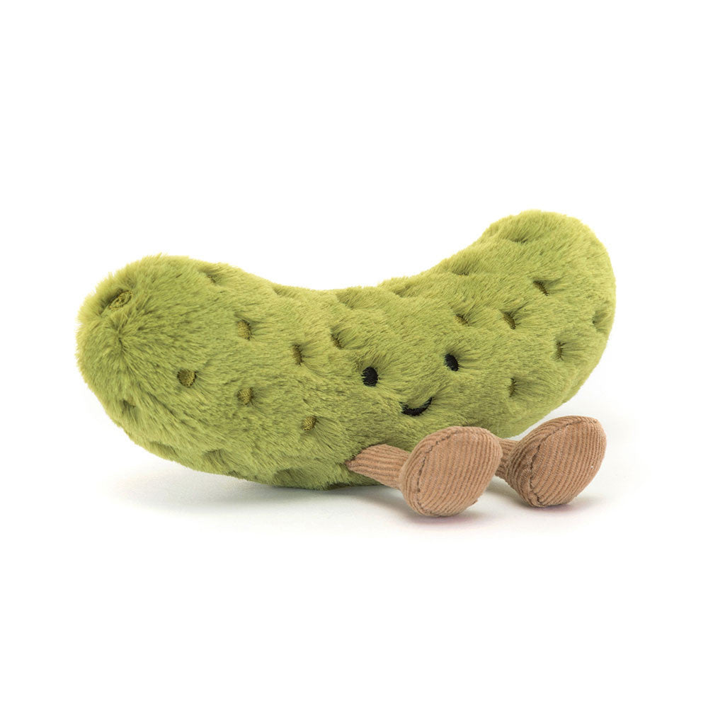 Plush Pickle with a cute little face and dangling legs