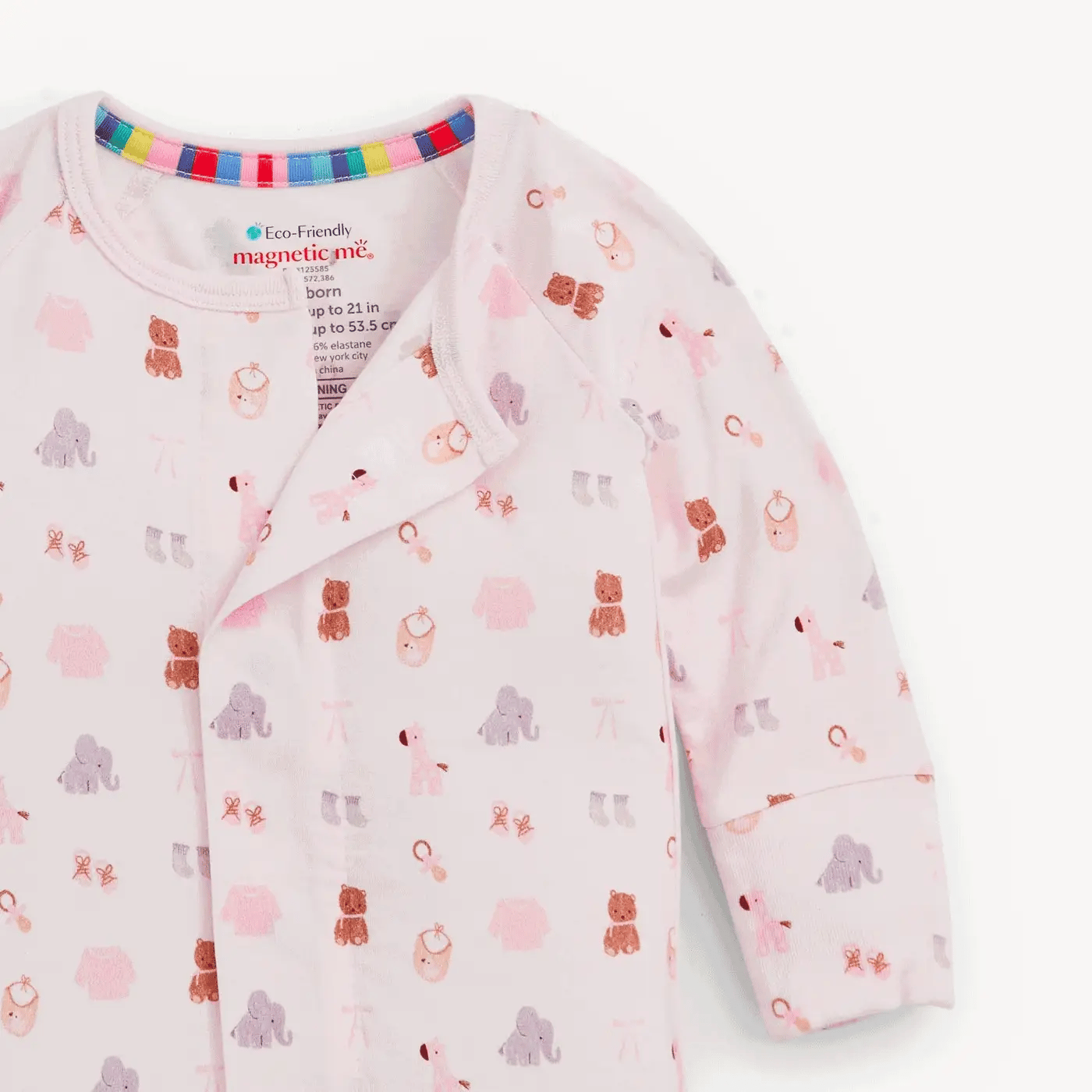 A light pink long-sleeve baby sleep sack with an all-over animal print of bears, elephants, and lions in soft pastel colors. It features a colorful striped inner collar and a visible 'magnetic mic' brand label inside the neckline.