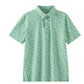 Green patterned polo shirt with soccer print