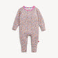 Floral-patterned baby onesie with colorful trim on a white background