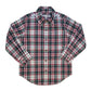 Long-sleeve plaid shirt with red, green, and white stripes over a white base, paired with blue jeans, against a solid gray background.