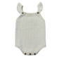 Knitted baby romper with ruffled shoulder straps on a white background