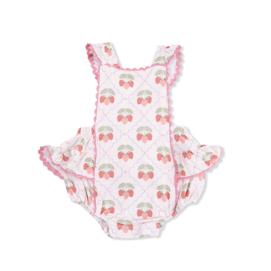 Baby romper with strawberry pattern on a white background