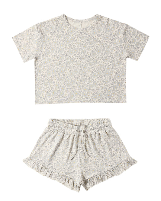 Floral-patterned crop top and shorts set on a white background
