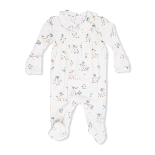 Baby onesie with floral pattern and ducks on a white background