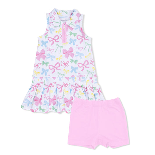 Children's outfit with a sleeveless top and pink shorts on a white background