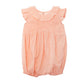 Peach-colored baby romper with ruffled collar 